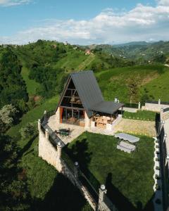 an aerial view of a house on a hill at Koda Bungalov in Ardeşen