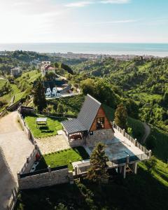 an aerial view of a house on a hill at Koda Bungalov in Ardeşen +32 photos