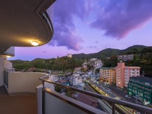 a view of a city from a balcony at Merveille Arima in Kobe
