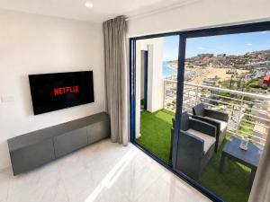 a living room with a view of the ocean at Torrevieja - La Mata Beach First Line New Apartments 2024r in La Mata