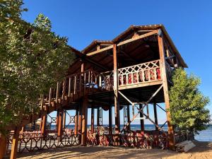 a wooden building with bikes parked in front of it at Free Beach Camp in Nuweiba‘ el Muzeinah