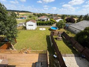 an aerial view of a yard with a frisbee at Treize Maison B-2 bed house in centre of Saint Severin in Saint-Séverin