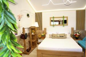 a bedroom with a bed and a couch at Thassion-ikea Feels Like Home in Astris +176 photos