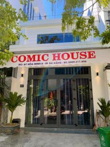 a comedia house sign on the front of a building at COMIC 2 Homestay in Danang