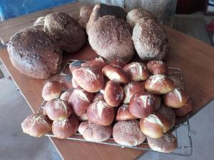 a bunch of donuts and pastries on a table at Cascina E&E in Costigliole dʼAsti