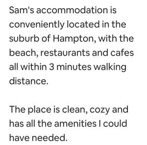 a screenshot of a cell phone with the words sans association is conveniently located in at Beachside flat with free parking in Melbourne