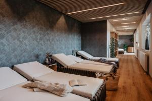 a row of hospital beds in a waiting room at Hotel am Haidel in Hinterschmiding
