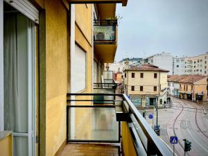 a balcony of a building with a view of a street at Ca dei Cappuccina in Mestre