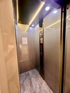 a elevator in a building with its door open at 有風別院民宿 登記編號3098 in Dongshan