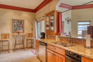 a kitchen with a sink and a counter top at Grande Getaway in South Fork +56 photos