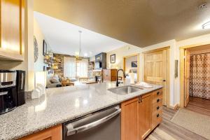 a kitchen with a sink and a counter top at Passage Point 521 in Frisco