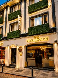a store front of a building with a viva rooms sign at Viva Rooms in Istanbul