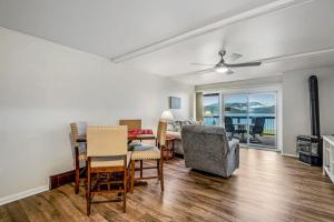 a living room with a table and chairs and a couch at Lakeside Mountain Retreat in Dillon