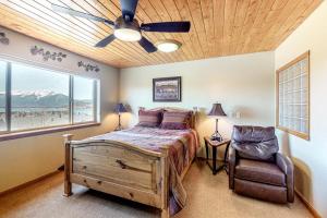 a bedroom with a bed and a ceiling fan at Dillon Dreamscape in Dillon