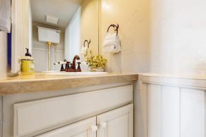 a bathroom with a sink and a mirror at East Vail Escape in Vail +41 photos