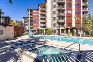 a swimming pool in the middle of a building at Torian Plum Plaza 302 in Steamboat Springs