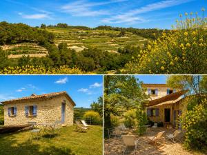 a stone house in the middle of a field at Le mas des genêts in Nyons