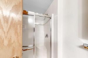 a shower stall in a bathroom with at Cozy Fraser Cabin in Fraser +33 photos