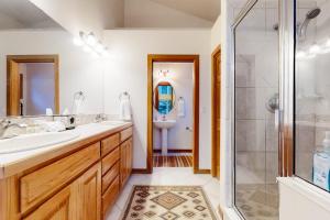 a bathroom with a sink and a shower at Elk Trail Retreat in Winter Park