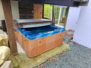 a large fish tank sitting in a house at Lakelands Cottage in Nenagh