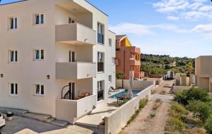 an apartment with a view of a building at Elia apartments in Ražanj