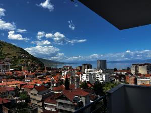a view of a city from a balcony at LakeView Pogradec in Pogradec
