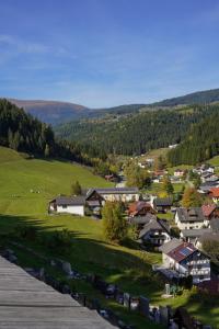 a small town with a train in a field at MyAlpenloft 2 in Deutschgriffen