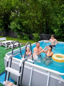 a group of people in a swimming pool at evkalipt in Ivano-Frankivsk