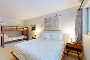 a bedroom with a bed and two bunk beds at SlopeSide Escape in Newry +74 photos