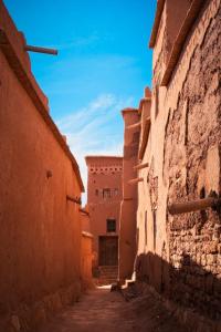 an alleyway with a building in the distance at Taddart n Dades in Boumalne Dades