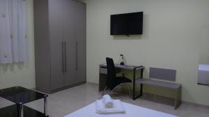 TV a/nebo společenská místnost v ubytování Hotel Primavera