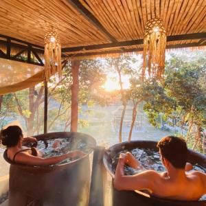 a couple of people in a bath tub at Abot Langit Calatagan in Calatagan