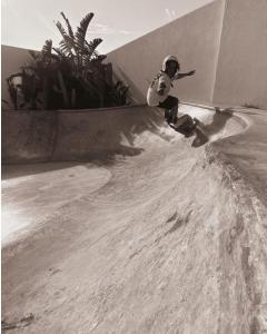 a person riding a skateboard in a skate park at Casa Biota in Sagres
