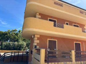 a view of the outside of a house at Carpa House in Valledoria +4 photos