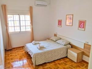 a bedroom with two beds and a window at Horizon Isla Tabarca in El Cabo de Gata