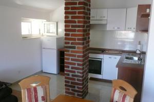 Kuchyň nebo kuchyňský kout v ubytování Apartments Toni, Borik