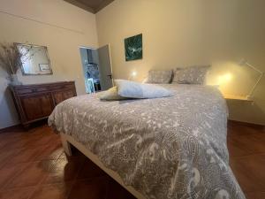 a bedroom with a bed and a dresser at Manor Meeder in Castanheira de Pêra +35 photos