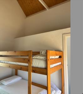 a bunk bed room with a bunk bed in a house at El Chalet in Punta Umbría