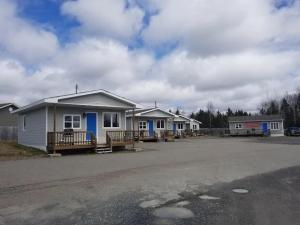 a row of houses in a parking lot at The Moosehead in Glenwood