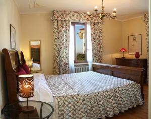 A bed or beds in a room at Claudio Appartamenti