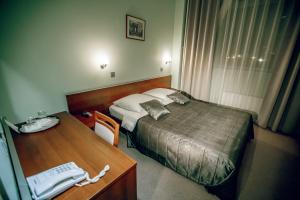 Кровать или кровати в номере Гостиница Новая Крепость