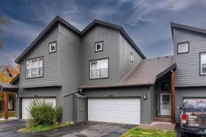a gray house with a garage at Aspen Getaway in Edwards