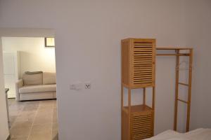 a room with a bed and a book shelf at Am Burg in Klotten