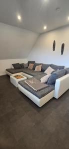 a room with three beds sitting on the floor at Ferienwohnung in Brunsbüttel mit E-Bike Verleih in Brunsbüttel +25 photos