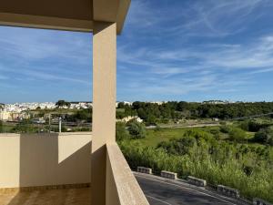 a view from the balcony of a building at Chilometro Mille Suites e Apartments in Otranto