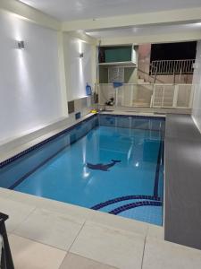 a large swimming pool in a building at 77 Fulaga Flats in Suva