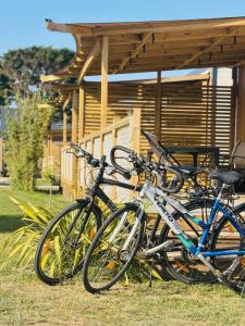 a group of bikes parked in front of a house at Domaine MON CALME in Piriac-sur-Mer