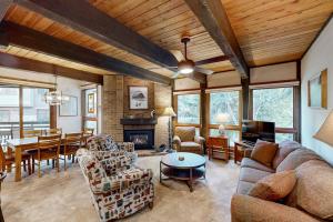 a living room with a couch and a table at The Lodge at Steamboat in Steamboat Springs