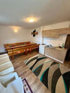 a living room with a couch and a table at Edi in Sarajevo