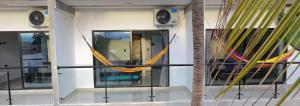 a room with a yellow rope on the side of a building at Villa Yasmin in Prado